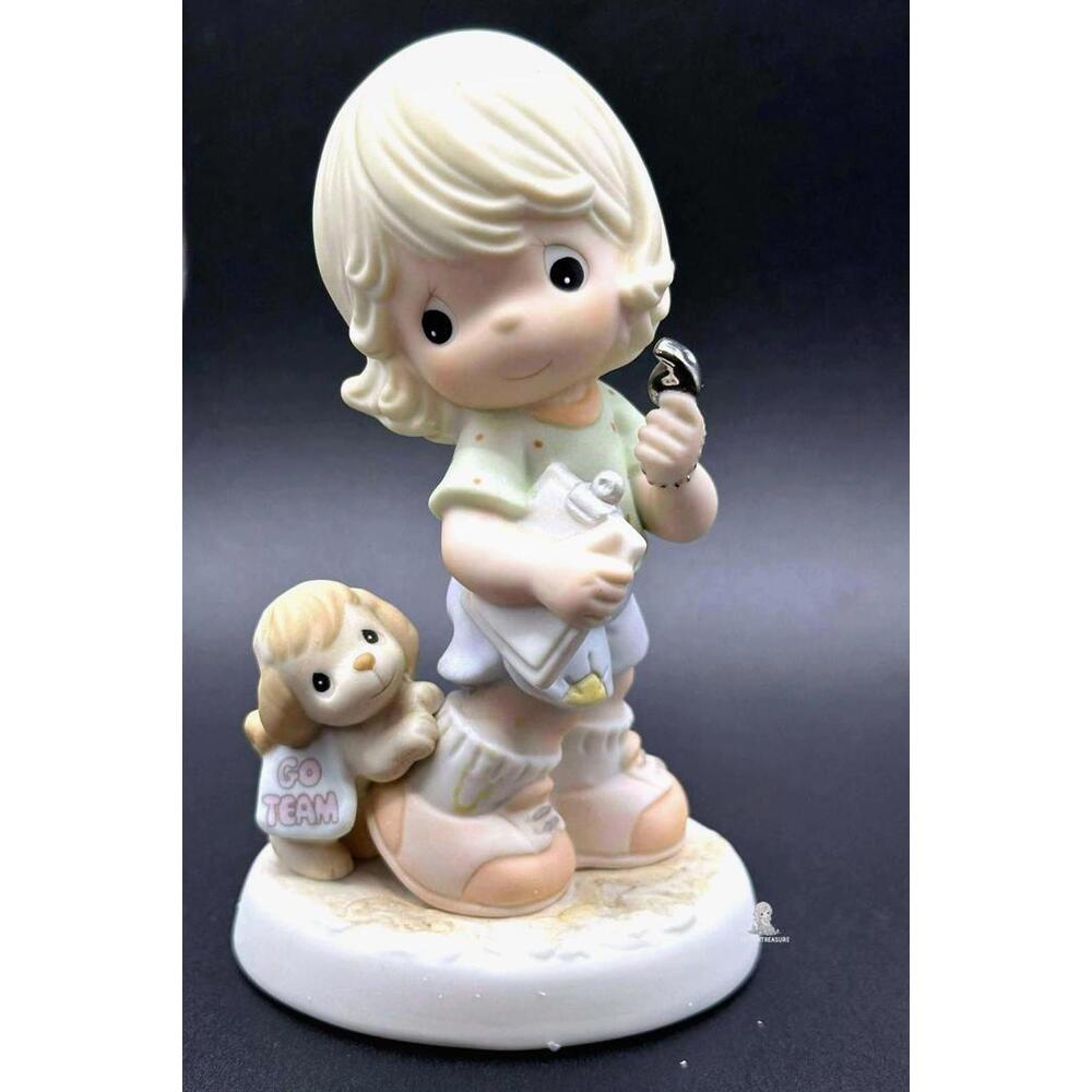 Precious Moments Cheerleader Figurine with Puppy.